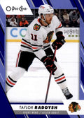 Taylor Raddysh #126 Chicago Blackhawks | 2023-24 O-Pee-Chee Blue Border